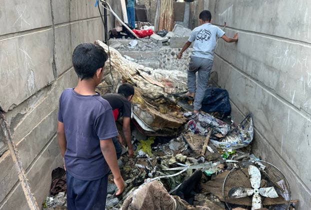 Palestinians inspect the damage caused by an Israeli midnight strike on an apartment building in the Tel al-Hawa neighborhood south of Gaza City Palestinians inspect the damage caused by an Israeli midnight strike on an apartment building in the Tel al-Hawa neighborhood south of Gaza City on July 6, 2026. The Israeli airstrike killed a man and his wife, injured others, and caused extensive damage to the targeted building. Photo by Mikael Bahar apaimages Gaza city Gaza Strip Palestinian Territory 060726_Gaza_MB_00(2) Copyright: xapaimagesxMikaelxBahar xapaimagesx