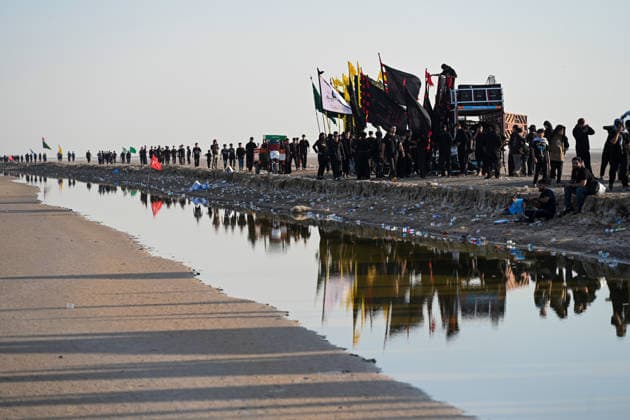 Hundreds walk from Faw to Karbala for Arbaeen commemorations FAW, IRAQ - JULY 06: People from southern Iraq cross the Arabian Gulf in the city of Faw as they walk toward Karbala to attend the Arbaeen commemorations, marking the 40th day after the martyrdom of Imam Hussein, the grandson of Prophet Muhammad, and 72 people accompanying him, in Iraq, on July 06, 2026. Karbala is home to the shrines of Imam Hussein and his brother Abbas. Haidar Mohammed Ali Anadolu Faw Iraq. Editorial use only. Please get in touch for any other usage.  Copyright: x2026xAnadoluxHaidarxMohammedxAlix