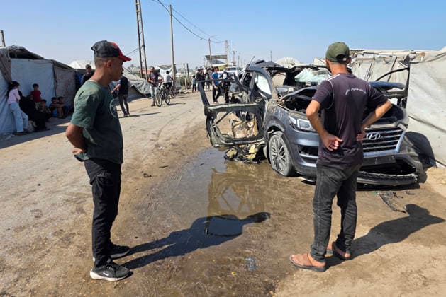 Palestinians inspect the damage caused by an Israeli airstrike on a vehicle near a camp for displaced people in Khan Younis Palestinians inspect the damage caused by an Israeli airstrike on a vehicle near a camp for displaced people in Khan Younis, southern Gaza Strip, on July 6, 2026. According to medical sources, the Israeli airstrike killed one person and injured 15 others. Photo by Tariq Mohammad APA Images Khan Yunis Gaza Strip Palestinian Territory 060726_Khan_Yunis_TM_00(1) Copyright: xapaimagesxTariqxMohammad xapaimagesx