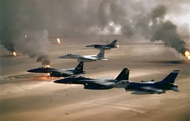 RECORD DATE NOT STATED USAF aircraft fly over Kuwaiti oil fires, 1991. USAF aircraft of the 4th Wing (F-16, F-15C and F-15E) fly over Kuwaiti oil fires, set by the retreating Iraqi army during Operation Desert Storm in 1991. Editorial Use only. All other uses to be cleared for permission with WHA or representative agent., WHA_197_1377.JPG.jpg, USAF; aircraft; 4th Wing; F-16; F-15C; F-15E; fly; Kuwaiti; oil fires; Iraqi army; Operation Desert Storm; 1991; military; jets; air force; aerial view; combat; mission; war; conflict; Middle East; smoke; flames; destruction; attack; bombing; aviation; sky; clouds; horizon; history Copyright: xWorldxHistoryxArchivex