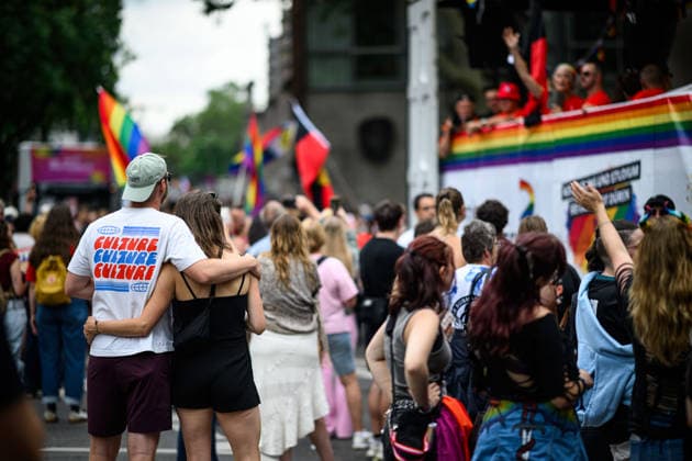 COLOGNE, GERMANY - 5 JULY, 2026: Crowd watches a Pride parade float with rainbow flags during a public street celebration. Street Parade of the Christopher Street Day (CSD), Gay Pride. LGBT  Copyright: xx
