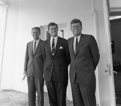 RECORD DATE NOT STATED Brothers Robert Kennedy, Edward Ted Kennedy, and John F. Kennedy, 1963. Brothers Robert Kennedy, Edward Ted Kennedy, and John F. Kennedy (left to right) just outside Oval Office, 1963. Editorial Use only. All other uses to be cleared for permission with WHA or representative agent., WHA_197_1558.JPG.jpg, Brothers; Robert Kennedy; Edward Kennedy; Ted Kennedy; John F. Kennedy; Oval Office; 1963; Kennedy family; political figures; historical photo; American history; siblings; politicians; iconic image; Kennedy brothers; United States; presidential family; influential figures; 1960s; American politics; famous brothers; Kennedy legacy; political leaders; Kennedy administration; Kennedy brothers portrait; Kennedy brothe Copyright: xx