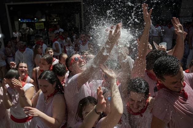 San Fermin festival opens with Chupinazo celebration in Pamplona PAMPLONA, SPAIN - JULY 6: Revellers enjoy the atmosphere during the opening day or Chupinazo of the San Fermin in on July 6, 2026. Every year, thousands of people flock to Pamplona for a week-long festival and its famous running of the bulls. During the running of the bulls, six bulls and six oxen are released each day at 8:00 a.m. to run from the corral to the bullring through narrow streets, a tradition that dates back to the Middle Ages. The week-long festival also features fireworks, religious processions, folkloric dancing, concerts, and drinking. Pamploa Navarre ES Copyright: x xGarixGaraialdex xJNAxPressx
