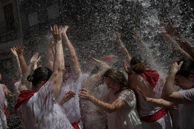 San Fermin festival opens with Chupinazo celebration in Pamplona PAMPLONA, SPAIN - JULY 6: Revellers enjoy the atmosphere during the opening day or Chupinazo of the San Fermin in on July 6, 2026. Every year, thousands of people flock to Pamplona for a week-long festival and its famous running of the bulls. During the running of the bulls, six bulls and six oxen are released each day at 8:00 a.m. to run from the corral to the bullring through narrow streets, a tradition that dates back to the Middle Ages. The week-long festival also features fireworks, religious processions, folkloric dancing, concerts, and drinking. Pamploa Navarre ES Copyright: x xGarixGaraialdex xJNAxPressx