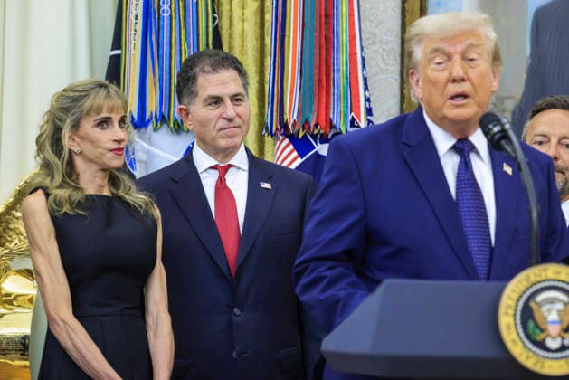 Investor Michael Dell (C) and his wife Susan Dell (L) look on as US President Donald J. Trump (R) speaks on the first day of trading for Trump Accounts in the Oval Office of the White House in Washington, DC, on Monday, July 6, 2026. Trump Accounts grant eligible US children born between 2026 and 2028 $1000.00 to fund starter IRAs.  WASP20260706111 SHAWNxTHEW