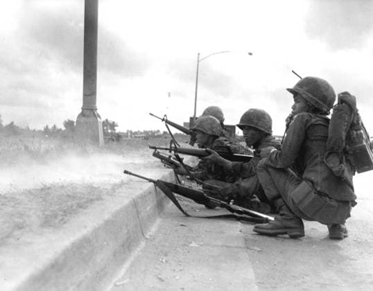 RECORD DATE NOT STATED Photo of ARVN Rangers in Combat during the Tet Offensive. Photograph ARVN Rangers defend Saigon during the Tet Offensive Saigon, 1969, depicts soldiers in combat gear crouching behind a curb, aiming rifles in an urban setting, indicative of military engagement during the Vietnam War. 1969. Editorial use only. All other uses to be cleared with the copyright owner (World History Archive), in advance., WHA_298_0076.jpg, Vietnam War; Tet Offensive; Saigon; ARVN Rangers; ARVN; 1969; South Vietnam; Republic of Vietnam; Urban Combat; Battle of Saigon; Cold War; Southeast Asian History; Military History; Defense Operations; Indochina Wars; South Vietnamese Forces; Communist Offensive; Guerrilla Warfare; Post-Tet Offensive Ope Copyright: xWorldxHistoryxArchivex