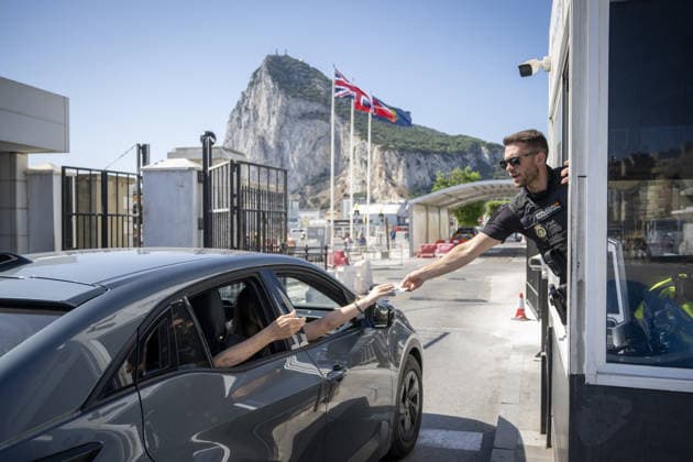 Border traffic increases between Spain and Gibraltar LA LINEA DE LA CONCEPCION, SPAIN - JULY 6: Spanish Civil Guard officer checks document and passports at the border crossing between Spain and Gibraltar, in the southern Spanish border town of La Linea de la Concepcion, Spain on July 6, 2026. Sizable traffic delays have hit the border checkpoint amid ongoing diplomatic transitions and updated entry-exit system implementations ahead of the summer tourism season. Marcos Moreno Anadolu La Linea de la Concepcion Spain. Editorial use only. Please get in touch for any other usage.  Copyright: x2026xAnadoluxMarcosxMorenox