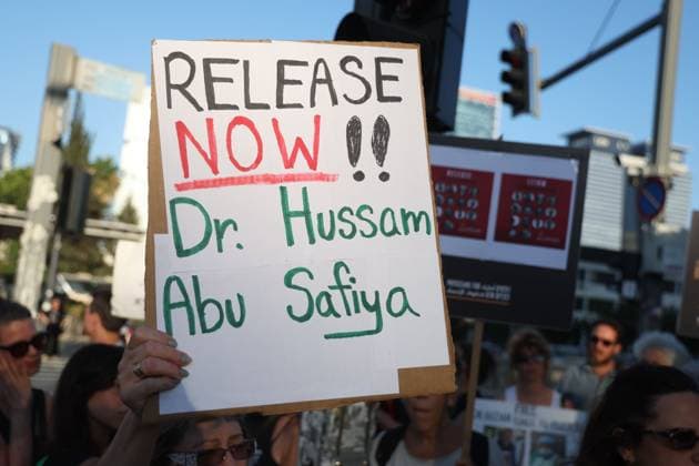 Protest in Tel Aviv Calls for Release of Palestinian Doctor Hussam Abu Safiya TEL AVIV, ISRAEL JULY 6, 2026: Demonstrators gather outside the Government Complex at Kaplan Street in Tel Aviv to demand the immediate release of Palestinian doctor Hussam Abu Safiya. Protesters carried banners and placards calling for his release, expressing concern over his reported detention conditions, and urging protection for medical personnel and political prisoners. The demonstration was held in response to claims by supporters and his legal representative regarding his treatment while in detention. Tel Aviv Israel Copyright: x xSaeedxQaqx xJNAxPressx