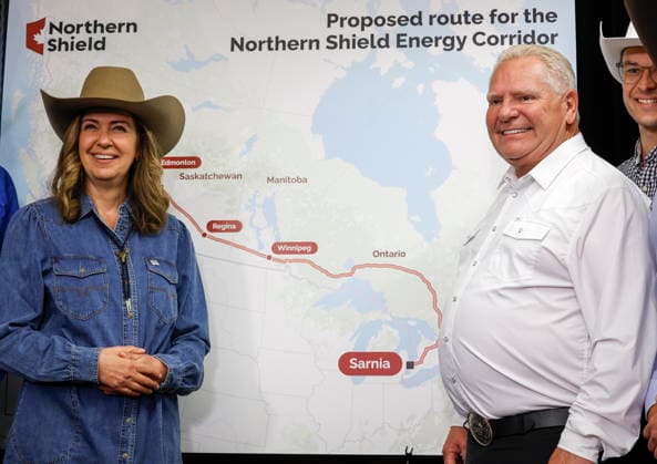 July 6, 2026, Calgary, Ab, CANADA: Alberta Premier Danielle Smith, left, and Ontario Premier Doug Ford pose with a map of the Northern Shield pipeline proposal in Calgary, Monday, July 6, 2026. Calgary CANADA  - ZUMAc35_ 20260706_zaf_c35_041 Copyright: xJeffxMcintoshx