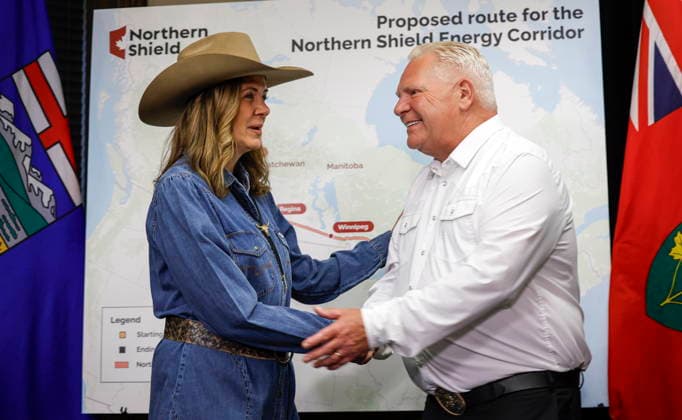 July 6, 2026, Calgary, Ab, CANADA: Alberta Premier Danielle Smith, left, and Ontario Premier Doug Ford pose with a map of the Northern Shield pipeline proposal in Calgary, Monday, July 6, 2026. Calgary CANADA  - ZUMAc35_ 20260706_zaf_c35_042 Copyright: xJeffxMcintoshx