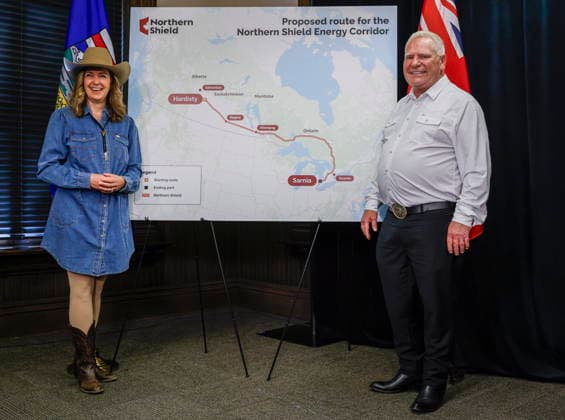 July 6, 2026, Calgary, Ab, CANADA: Alberta Premier Danielle Smith, left, and Ontario Premier Doug Ford pose with a map of the Northern Shield pipeline proposal in Calgary, Monday, July 6, 2026. Calgary CANADA  - ZUMAc35_ 20260706_zaf_c35_044 Copyright: xJeffxMcintoshx
