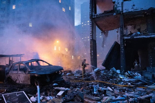 RECORD DATE NOT STATED A rescuer extinguishes a fire caused by a massive combined Russian attack, Kyiv, Ukraine, on July 6, 2026. Russian forces launched a large-scale attack on the capital using ballistic and cruise missiles as well as attack drones, causing destruction to apartment buildings and civilian infrastructure across several districts of the city. The Podilskyi district suffered the most severe damage. At least 11 people were killed and 46 others were injured (Photo by Danylo Antoniuk Ukrinform) Russia launches another massive strike on Kyiv  Copyright: xDanyloxAntoniukx