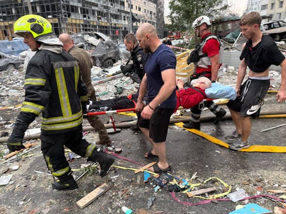 RECORD DATE NOT STATED A rescuer extinguishes a fire in a car destroyed in a massive combined Russian attack, Kyiv, Ukraine, on July 6, 2026. Russian forces launched a large-scale attack on the capital using ballistic and cruise missiles as well as attack drones, causing destruction to apartment buildings and civilian infrastructure across several districts of the city. The Podilskyi district suffered the most severe damage. At least 11 people were killed and 46 others were injured (Photo by Kyrylo Chubotin Ukrinform) Russia launches another massive strike on Kyiv  Copyright: xKyryloxChubotinx