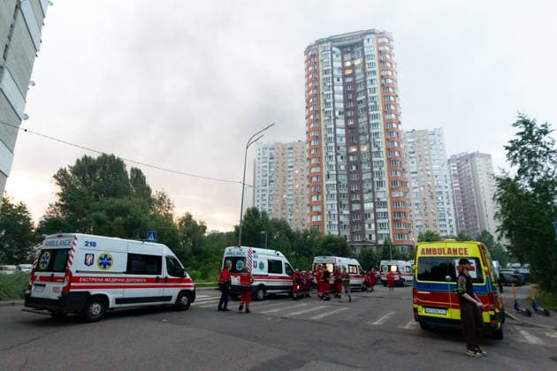 RECORD DATE NOT STATED Ambulances are parked near the site of a massive combined Russian strike on Kyiv, Ukraine, on July 6, 2026. Russian forces launched ballistic and cruise missiles together with attack drones, causing widespread destruction to apartment buildings and civilian infrastructure in several parts of the city. The Podilskyi district suffered the greatest damage. At least 11 people were killed and 46 others were injured (Photo by Kyrylo Chubotin Ukrinform) Russia launches another massive strike on Kyiv  Copyright: xKyryloxChubotinx