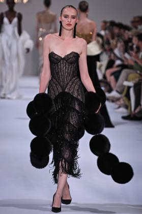 PFW - Tamara Ralph Runway in Paris FA A model walks the runway the Autumn-Winter 2027 2028 couture collection by Tamara Ralph during the Paris Fashion Week, on July 6, 2026. Photo by Firas Abdullah ABACAPRESS.COM Paris Ile-de-France France  Copyright: xAbdullahxFiras ABACAx
