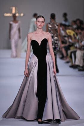 PFW - Tamara Ralph Runway in Paris FA A model walks the runway the Autumn-Winter 2027 2028 couture collection by Tamara Ralph during the Paris Fashion Week, on July 6, 2026. Photo by Firas Abdullah ABACAPRESS.COM Paris Ile-de-France France  Copyright: xAbdullahxFiras ABACAx