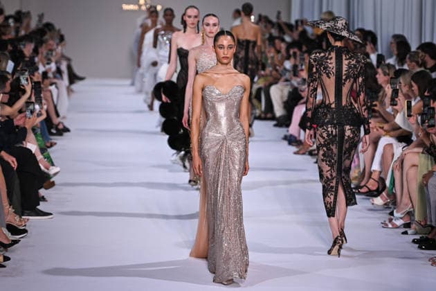 PFW - Tamara Ralph Runway in Paris FA A model walks the runway the Autumn-Winter 2027 2028 couture collection by Tamara Ralph during the Paris Fashion Week, on July 6, 2026. Photo by Firas Abdullah ABACAPRESS.COM Paris Ile-de-France France  Copyright: xAbdullahxFiras ABACAx