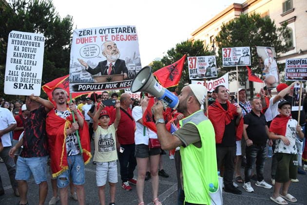 Protests continue in Albania against tourism project in Zvernec TIRANA, ALBANIA - JULY 6: Protesters gather at Skanderbeg Square on the 37th day of demonstrations against a planned tourism project in the Zvernec area of Vlora, chanting the slogan Albania is not for sale in Tirana, Albania, on July 6, 2026. Olsi Shehu Anadolu Tirana Albania. Editorial use only. Please get in touch for any other usage.  Copyright: x2026xAnadoluxOlsixShehux