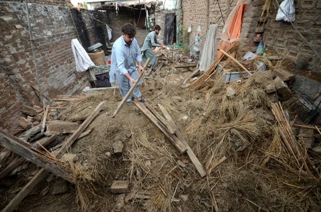 July 6, 2026, Peshawar, Peshawar, Pakistan: Severe Storm and Heavy Rain Lash Peshawar, Leaving Widespread Damage and Multiple Injuries..Peshawar, Pakistan, July, 06: Torrential rain and a powerful windstorm caused widespread destruction across Peshawar, uprooting trees, damaging homes, and flooding major roads. In one incident, the collapse of a house roof left four women and several children seriously injured. Streets in several areas were submerged, resembling ponds and disrupting daily life as rescue and emergency teams responded to the affected locations. Peshawar Pakistan - ZUMAa217 20260706_znp_a217_027 Copyright: xHussainxAlix