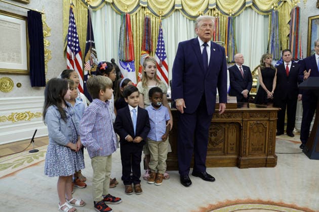 US President Donald J. Trump prepares to speak on the first day of trading for Trump Accounts in the Oval Office of the White House in Washington, DC, USA, 06 July 2026. Trump Accounts grant eligible US children born between 2026 and 2028 $1000.00 to fund ‘starter’ IRAs. Copyright: xShawnxThewx xPoolxviaxCNPx MediaPunchx