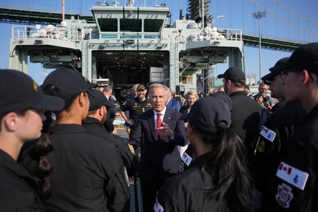 July 6, 2026, Halifax, Ns, Canada: Prime Minister Mark Carney greets sailors following an announcement that German shipbuilder ThyssenKrupp Marine Systems (TKMS) will build the Canadian navy s new fleet of submarines at HMC Dockyard in Halifax on Monday, July 6, 2026. Halifax Canada  - ZUMAc35_ 20260706_zaf_c35_086 Copyright: xDarrenxCalabresex