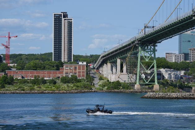 July 6, 2026, Halifax, Ns, Canada: A security boat patrols Halifax Harbour as Prime Minister Mark Carney announces German shipbuilder ThyssenKrupp Marine Systems (TKMS) will build the Canadian navy s new fleet of submarines at HMC Dockyard in Halifax on Monday, July 6, 2026. Halifax Canada  - ZUMAc35_ 20260706_zaf_c35_088 Copyright: xDarrenxCalabresex
