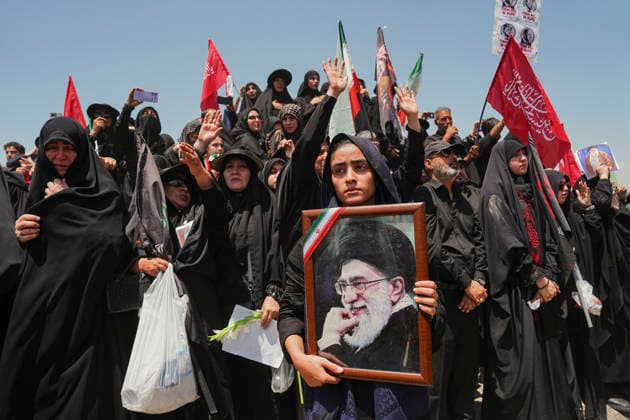Tehran Funeral Procession For Khamenei A mourner holds a portrait of Iran s slain supreme leader Ayatollah Ali Khamenei as people attend the funeral procession of him and his family members in Tehran on July 6, 2026. Vast crowds gathered for the funeral procession of Iran s slain supreme leader Ali Khamenei in Tehran on July 6, with authorities estimating millions were on the streets in numbers that could rival those of his predecessor s farewell nearly four decades ago. Tehran Tehran Iran Copyright: xArezoox