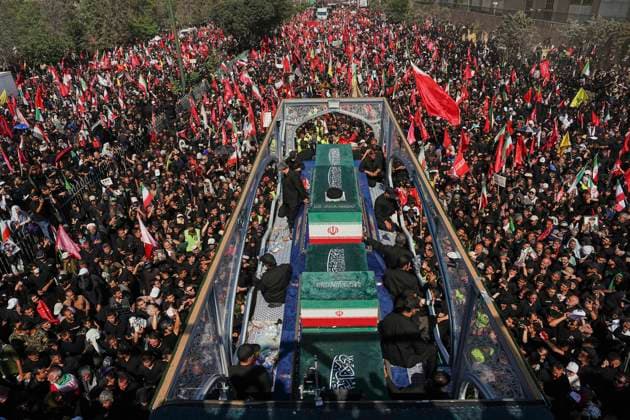 Tehran Funeral Procession For Khamenei Crowds of mourners surround the convoy carrying the coffins of Iran s slain supreme leader Ali Khamenei and members of his family during a funeral procession near Azadi Square in Tehran on July 6, 2026. Vast crowds gathered for the funeral procession of Iran s slain supreme leader Ali Khamenei in Tehran on July 6, with authorities estimating millions were on the streets in numbers that could rival those of his predecessor s farewell nearly four decades ago. Tehran Tehran Iran Copyright: xArezoox