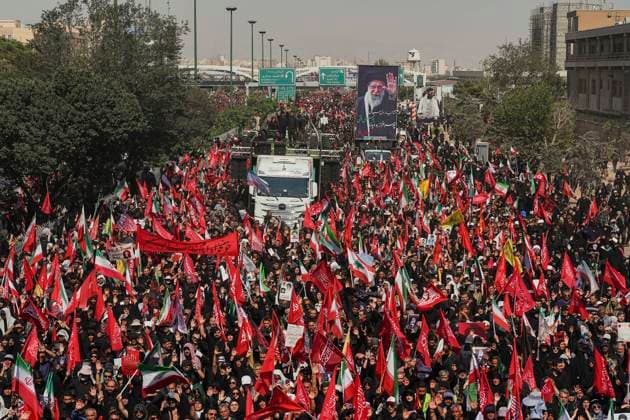 Tehran Funeral Procession For Khamenei Crowds of mourners surround the convoy carrying the coffins of Iran s slain supreme leader Ali Khamenei and members of his family during a funeral procession near Azadi Square in Tehran on July 6, 2026. Vast crowds gathered for the funeral procession of Iran s slain supreme leader Ali Khamenei in Tehran on July 6, with authorities estimating millions were on the streets in numbers that could rival those of his predecessor s farewell nearly four decades ago. Tehran Tehran Iran Copyright: xArezoox