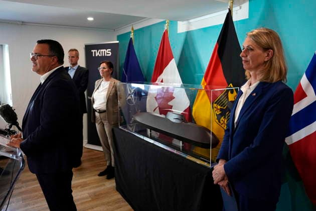 July 6, 2026, Ottawa, On, CAN: A model of the Type 212CD submarine is seen as TKMS CEO Oliver Burkhard speaks at a news conference at the Embassy of Germany in Ottawa with Volkmar Dinstuhl, ThyssenKrupp board member and chairman of the supervisory board of TKMS, second from left, Ambassador of Norway to Canada Hanne Ulrichsen, and Ambassador of Germany to Canada Tjorven Bellmann, right, on Monday, July 6, 2026. Germany s TKMS has been chosen as the preferred bidder to supply the navy s next fleet of submarines, over South Korea s Hanwha. Ottawa CAN  - ZUMAc35_ 20260706_zaf_c35_105 Copyright: xJustinxTangx