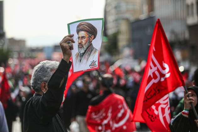 (260707) -- BEIJING, July 7, 2026 -- People take part in a procession to bid farewell to Iran s late Supreme Leader Ali Khamenei in Tehran, Iran, July 6, 2026. ( Handout via Xinhua) XINHUA PHOTOS OF THE DAY MehrxNewsxAgency 