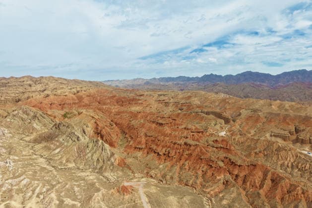 ZHANGYE, CHINA - JULY 06: Aerial view of Alien Valley Geopark on July 6, 2026 in Sunan Yugur Autonomous County, Zhangye City, Gansu Province of China. The scenic area features natural landscapes that resemble the surface of an alien planet.  Copyright: xChinaxNewsxServicex 111652657295