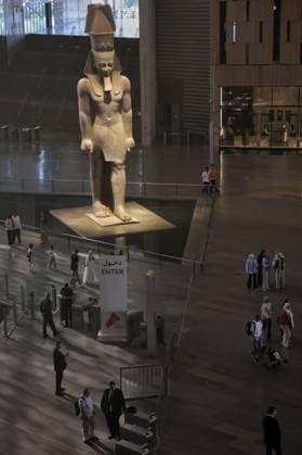 People walk past a statue of King Ramses II at the entrance of the Grand Egyptian Museum (GEM), in Giza, Egypt Cairo, Egypt July 6, 2026: The colossal statue of King Ramesses II dominates the Grand Hall of the Grand Egyptian Museum (GEM), welcoming visitors at the museum s main entrance. Standing approximately 11 meters tall and weighing around 83 tons, the red granite masterpiece dates back more than 3,200 years to Egypt s 19th Dynasty. Originally discovered in the ancient city of Memphis, the statue symbolizes the power and legacy of one of ancient Egypt s greatest pharaohs. Today, it serves as one of the Grand Egyptian Museum s most iconic landmarks, reflecting the grandeur of Egypt s rich archaeological Mahmoud Ghany Giza Egypt Copyright: x xMahmoudxAhmedxabdxelghanyx xJNAxPressx