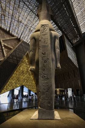 People walk past a statue of King Ramses II at the entrance of the Grand Egyptian Museum (GEM), in Giza, Egypt Cairo, Egypt July 6, 2026: The colossal statue of King Ramesses II dominates the Grand Hall of the Grand Egyptian Museum (GEM), welcoming visitors at the museum s main entrance. Standing approximately 11 meters tall and weighing around 83 tons, the red granite masterpiece dates back more than 3,200 years to Egypt s 19th Dynasty. Originally discovered in the ancient city of Memphis, the statue symbolizes the power and legacy of one of ancient Egypt s greatest pharaohs. Today, it serves as one of the Grand Egyptian Museum s most iconic landmarks, reflecting the grandeur of Egypt s rich archaeological Mahmoud Ghany Giza Egypt Copyright: x xMahmoudxAhmedxabdxelghanyx xJNAxPressx