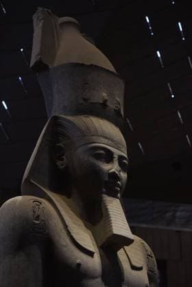 People walk past a statue of King Ramses II at the entrance of the Grand Egyptian Museum (GEM), in Giza, Egypt Cairo, Egypt July 6, 2026: The colossal statue of King Ramesses II dominates the Grand Hall of the Grand Egyptian Museum (GEM), welcoming visitors at the museum s main entrance. Standing approximately 11 meters tall and weighing around 83 tons, the red granite masterpiece dates back more than 3,200 years to Egypt s 19th Dynasty. Originally discovered in the ancient city of Memphis, the statue symbolizes the power and legacy of one of ancient Egypt s greatest pharaohs. Today, it serves as one of the Grand Egyptian Museum s most iconic landmarks, reflecting the grandeur of Egypt s rich archaeological Mahmoud Ghany Giza Egypt Copyright: x xMahmoudxAhmedxabdxelghanyx xJNAxPressx