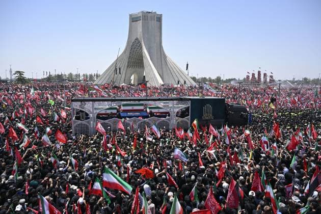 Funeral for Iran s ex-leader Khamenei A truck carrying late Iranian Supreme Leader Ayatollah Ali Khamenei s coffin crawls through crowds in a funeral procession in Tehran, Iran, on July 6, 2026, following his death in Israeli and U.S. airstrikes in February.  A14AA0005621972P
