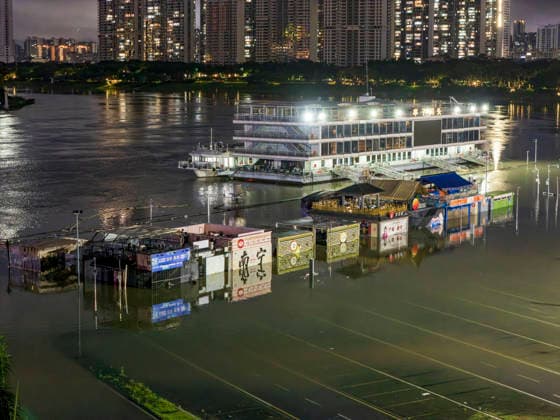China Guangxi Flooding A riverside park is seen inundated by the surging flood brought by Typhoon Maysak in Nanning, Guangxi Zhuang Autonomous Region, southern China, on Monday, July 6, 2026., Credit:HU YAN Utuku Feature China Avalon CHINA, GUANGXI, NANNING  Copyright: xHUxYANx xUtuku FeaturexChinax xAvalonx 1114881701