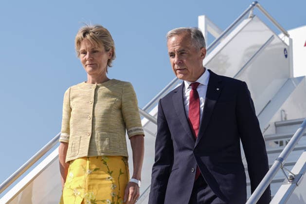 NATO Heads of State and Government Summit in Ankara ANKARA, TURKIYE - JULY 07: Canadian Prime Minister Mark Carney (R) and his wife, Diana Fox Carney (L), arrive at Ankara Airport to attend the 36th NATO Heads of State and Government Summit in Ankara, Turkiye, on July 07, 2026. Osmancan Gurdogan Anadolu Ankara Turkey. Editorial use only. Please get in touch for any other usage.  Copyright: x2026xAnadoluxOsmancanxGurdoganx