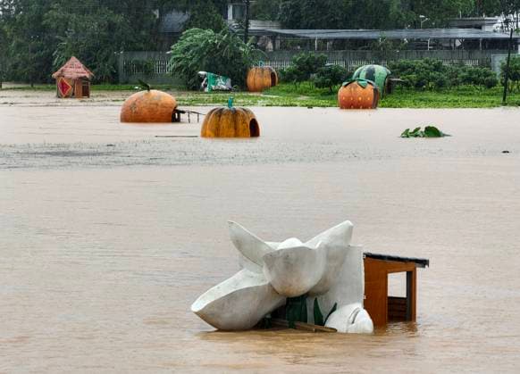 NANNING, CHINA - JULY 07: Floodwaters submerge villages and farmlands with only the tops of jasmine planting sheds visible after typhoon Maysak on July 7, 2026 in Hengzhou, Nanning, Guangxi Zhuang Autonomous Region of China. Local authorities are organizing the evacuation of residents in affected areas of Hengzhou City in Guangxi.  Copyright: xVCGx 111652794679