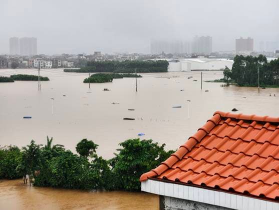 NANNING, CHINA - JULY 07: Floodwaters submerge villages and farmlands with only the tops of jasmine planting sheds visible after typhoon Maysak on July 7, 2026 in Hengzhou, Nanning, Guangxi Zhuang Autonomous Region of China. Local authorities are organizing the evacuation of residents in affected areas of Hengzhou City in Guangxi.  Copyright: xVCGx 111652794685