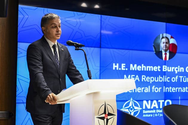 Opening session of the NATO Summit Dialogues event in Ankara ANKARA, TURKIYE - JULY 7: Ambassador Mehmet Burcin Gonenli, Director General for International Security Affairs at the Ministry of Foreign Affairs, delivers an opening speech at a podium, during the opening session of the NATO Summit Dialogues event in Ankara, Turkiye, on July 7, 2026. Organized jointly by the Turkish Atlantic Council (ATA Turkiye) and the Hariciye Foreign Policy and Security Research Center, the event commenced with Georgiou s address targeting key security and foreign policy discussions aligned with the broader NATO framework. Fatma Nur Arslan Anadolu Ankara Turkey. Editorial use only. Please get in touch for any other usage.  Copyright: x2026xAnadoluxFatmaxNurxArslanx