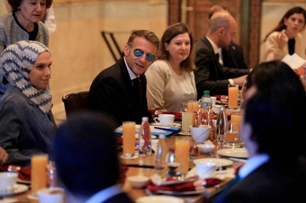 President Macron Meets With Representatives Of Syrian Civil Society - Damascus France s President Emmanuel Macron (C) speaks as he attends a breakfast to meet with representatives of Syrian civil society in Damascus on July 7, 2026. French President Emmanuel Macron arrived in Damascus on July 6, 2026 for the first visit by a Western European head of state since Syria s new authorities took power in 2024, an AFP journalist said. Macron, who will depart on July 7, 2026, will advocate for a free, pluralist Syria that respects each of its components and plays a role in moderating Middle East tensions, the French presidency told journalists ahead of his arrival. Photo by Ludovic Marin Pool ABACAPRESS.COM Damascus Syria  Copyright: xMarinxLudovic Pool ABACAx