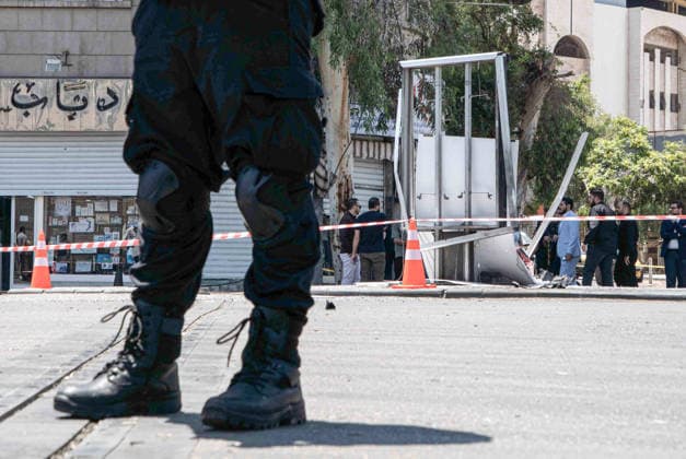Eighteen injured in double explosions near Tourism Ministry in Syrian capital Damascus DAMASCUS, SYRIA - JULY 7: Security forces take strict security measures following two consecutive explosions that occurred near the Ministry of Tourism building, injuring 18 people including four security personnel, in Damascus, Syria on July 7, 2026. The area was cordoned off as emergency teams and security units responded to the aftermath of the twin blasts in the capital. Anagha Subhash Nair Anadolu Damascus Syria. Editorial use only. Please get in touch for any other usage.  Copyright: x2026xAnadoluxAnaghaxSubhashxNairx
