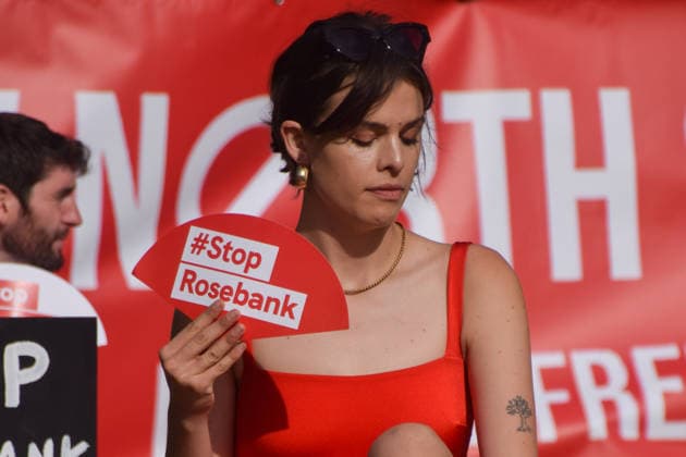 July 7, 2026, London, England, United Kingdom: Climate activists from the group Fossil Free London don swimming costumes and stage a Ã¢â‚¬Ëœsunbathe-inÃ¢â‚¬â ¢ protest dubbed Roast Against Rosebank in Parliament Square calling on the government to stop new North Sea oil and gas projects, as another heatwave hits the UK. London United Kingdom  - ZUMAv130 20260707_zip_v130_038 Copyright: xVukxValcicx