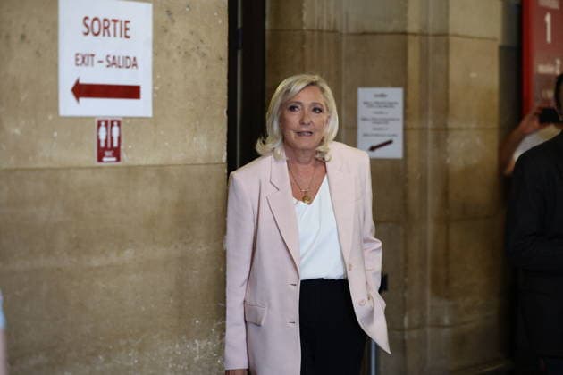 Marine Le Pen Appeal Trial Decision - Paris Marine Le Pen arriving at Paris courthouse before the decision on the appeal trial of President of the parliamentary group of the French far-right Rassemblement National (RN) party, Marine Le Pen and officials of French far-right Rassemblement National (RN) party on suspicion of embezzlement of European public funds, in Paris on July 7, 2026. The appeal comes after a court last year barred Le Pen from running for office for five years over a European Parliament fake-jobs scam involving her and other officials from her National Rally party. Photo by Raphael Lagargue ABACAPRESS.COM Paris France  Copyright: xLafarguexRaphael ABACAx