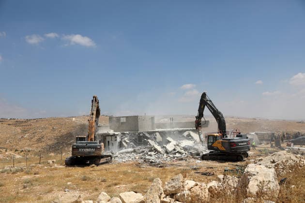 Israeli authorities demolish homes in Yatta south of Hebron Palestinians inspect demolished homes after Israeli authorities carried out demolition operations in the Yatta area, south of Hebron, in the occupied West Bank, on July 7, 2026. According to local sources, several homes were demolished on the grounds of lacking building permits, leaving a number of families displaced and causing damage to property. Photo by Mamoun Wazwaz apaimages Hebron West Bank Palestinian Territory 070726_Hebron_MW_00(17) Copyright: xapaimagesxMamounxWazwazx xapaimagesx