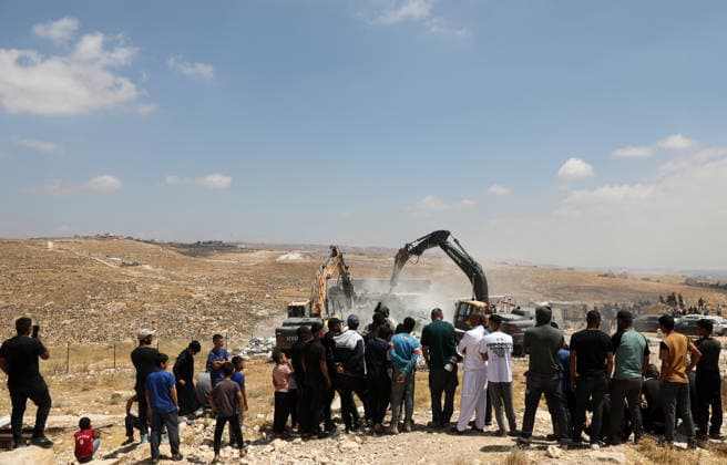 Israeli authorities demolish homes in Yatta south of Hebron Palestinians inspect demolished homes after Israeli authorities carried out demolition operations in the Yatta area, south of Hebron, in the occupied West Bank, on July 7, 2026. According to local sources, several homes were demolished on the grounds of lacking building permits, leaving a number of families displaced and causing damage to property. Photo by Mamoun Wazwaz apaimages Hebron West Bank Palestinian Territory 070726_Hebron_MW_00(23) Copyright: xapaimagesxMamounxWazwazx xapaimagesx