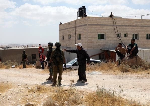 Israeli authorities demolish homes in Yatta south of Hebron Palestinians inspect demolished homes after Israeli authorities carried out demolition operations in the Yatta area, south of Hebron, in the occupied West Bank, on July 7, 2026. According to local sources, several homes were demolished on the grounds of lacking building permits, leaving a number of families displaced and causing damage to property. Photo by Mamoun Wazwaz apaimages Hebron West Bank Palestinian Territory 070726_Hebron_MW_00(9) Copyright: xapaimagesxMamounxWazwazx xapaimagesx