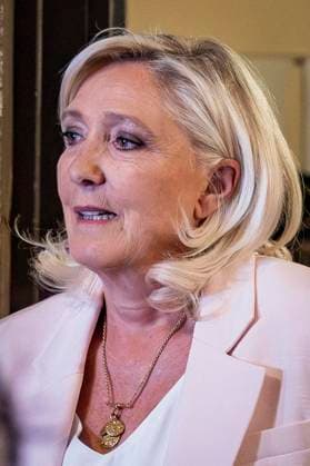 Marine Le Pen, chairwoman of the parliamentary group of the far-right National Rally (RN) party, arrives for the verdict in the appeals trial of former and current RN members accused of embezzling European public funds in a case involving the creation of fictitious jobs at the European Parliament, at the Paris courthouse, France, on July 7, 2026. The previous year, a trial court had sentenced Marine Le Pen, a long-standing figure in the party and three-time presidential candidate, to a five-year ban from holding public office and two years in prison for this case. The Court of Appeals was to rule on whether to uphold this ban, a decision that has jeopardized her presidential ambitions. Vincenzo Armone Bestimage President of the far-right p  Copyright: xVincenzoxArnonex xBestimagexVincenzoxArnonex xBestimagex