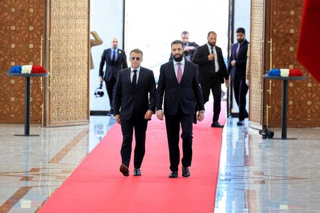 President Macron with President al-Sharaa Meeting - Damascus France s President Emmanuel Macron (L) and Syria s President Ahmed al-Sharaa arrive ahead of their meeting at the People s Palace in Damascus on July 7, 2026. Syria s President Ahmed al-Sharaa hailed France s constructive role in the transition since the toppling of longtime ruler Bashar al-Assad, as French leader Emmanuel Macron made the first post-conflict visit to Damascus by a Western European leader. Photo by Ludovic Marin Pool ABACAPRESS.COM Damascus Syria  Copyright: xMarinxLudovic Pool ABACAx